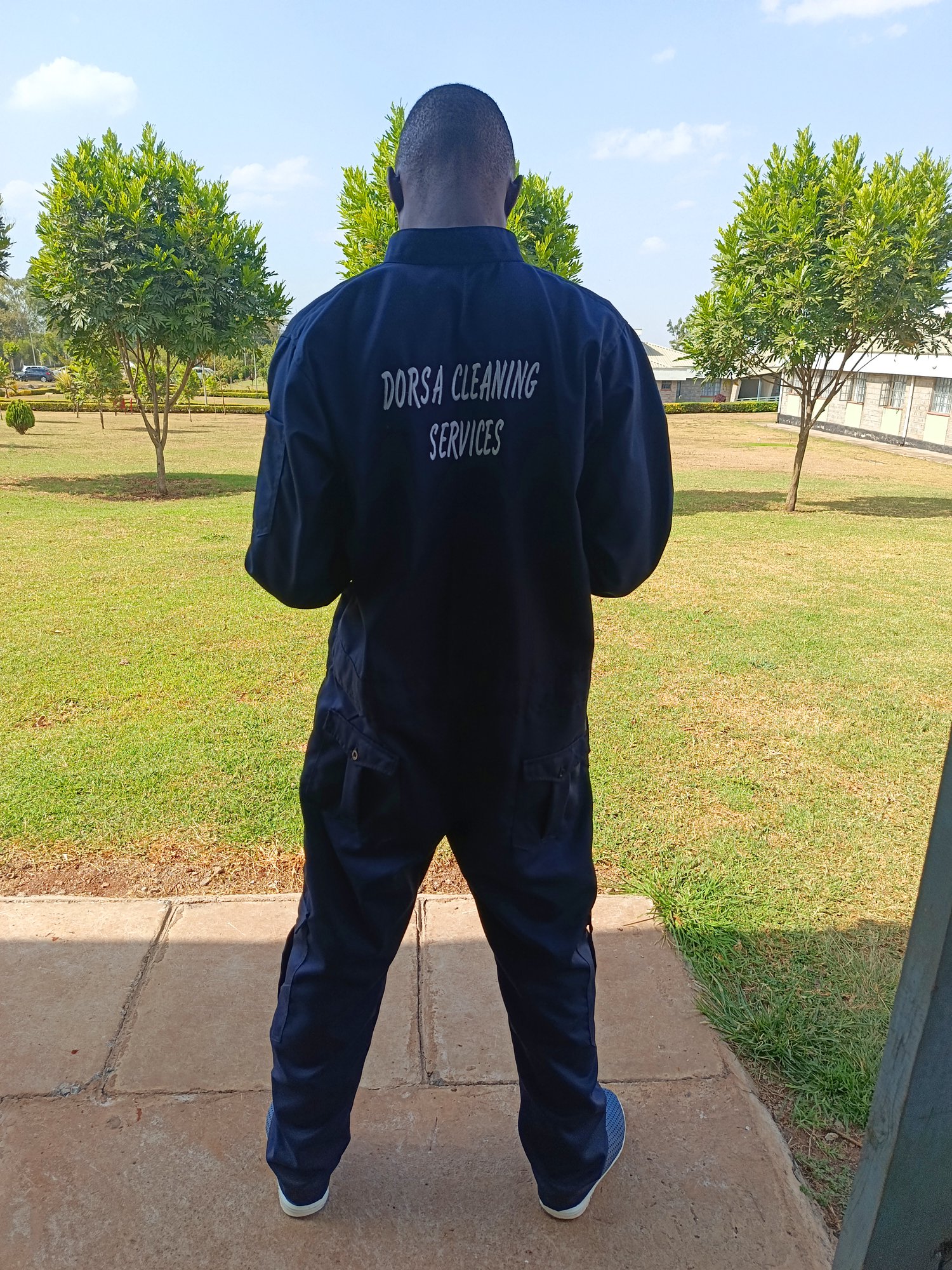 Dorsa Cleaning Services technician in branded company uniform on assignment in Nairobi