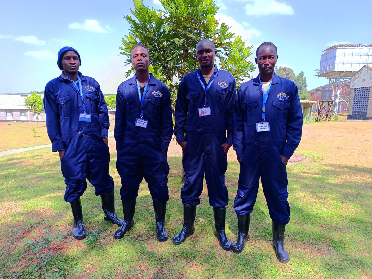 Dorsa field technicians in branded coveralls